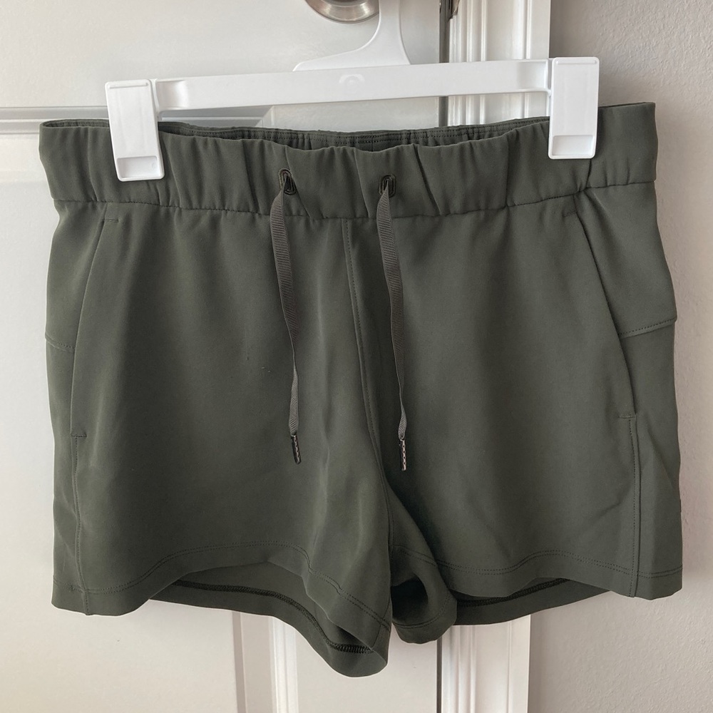 Lululemon Olive Green On The Fly Midrise Shorts